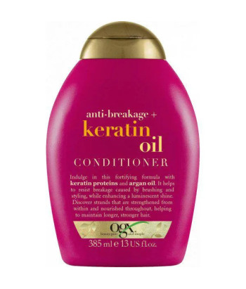 Revitalisez vos cheveux avec le revitalisant anti-casse à l'huile de kératine OGX 385ml